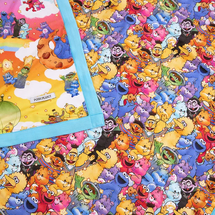 Cloudco Orange Reversible Baby Blanket | Care Bears™ x Sesame Friends & All Together