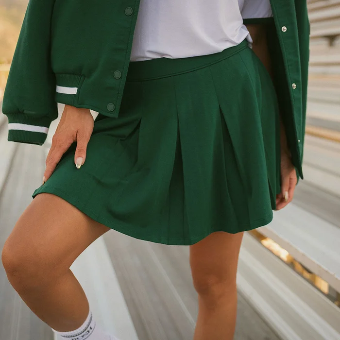 Collegiate Green Comfy Varsity Green Women’s French Terry Pleated Skort | Posh Peanut®